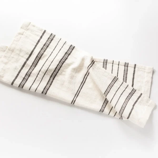 white cotton tea towel with black stripes.