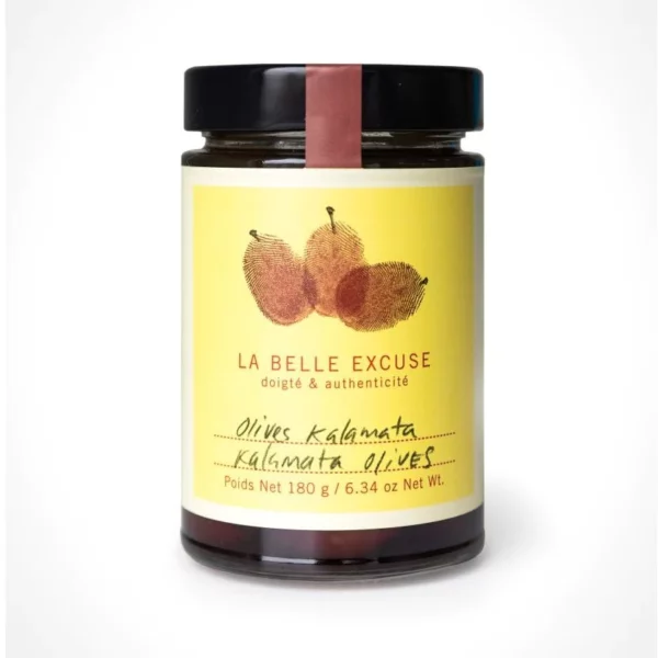 A dark glass jar containing Kalamata Olives from La Belle Excuse.