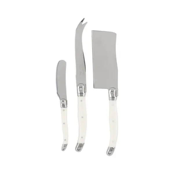 Three cheese knives are displayed together. The set includes a small spreading knife with a rounded tip, a curved knife with a pointed end for cutting soft cheeses, and a larger cleaver-style knife with a straight edge for slicing harder cheeses. All knives feature shiny stainless steel blades and elegant white handles with a polished finish.
