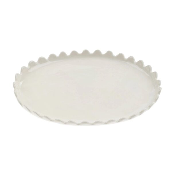 A round, white ceramic plate with a scalloped edge. The surface is smooth and glossy, reflecting light subtly. The design is simple yet elegant, suitable for serving or displaying food.