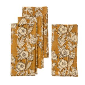 A collection of fabric napkins featuring a floral pattern. The background is a warm mustard yellow, adorned with intricate black and white illustrations of flowers and leaves. There are five napkins in total, arranged in a slightly overlapping manner, showcasing the design prominently.