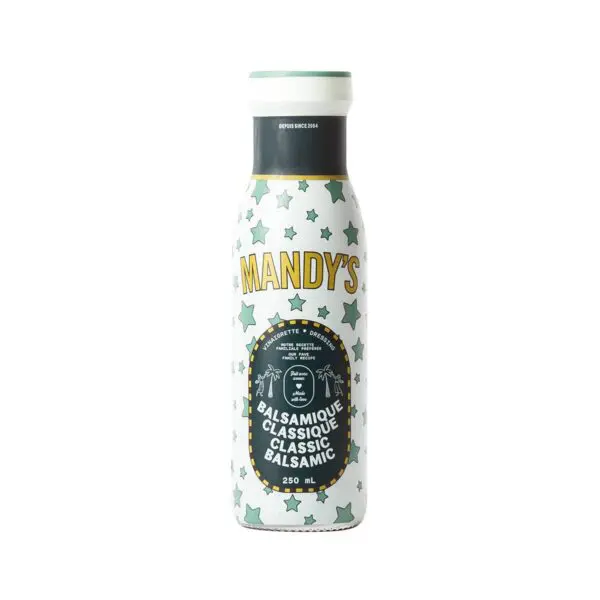 A decorative bottle of balsamic dressing with a white background adorned with green stars. The label prominently features the name "MANDY'S" in bold yellow letters. Below, it states "BALSAMIQUE CLASSIQUE" and "CLASSIC BALSAMIC" in a circular design. The bottle has a capacity of 250 mL and a simple, modern cap.
